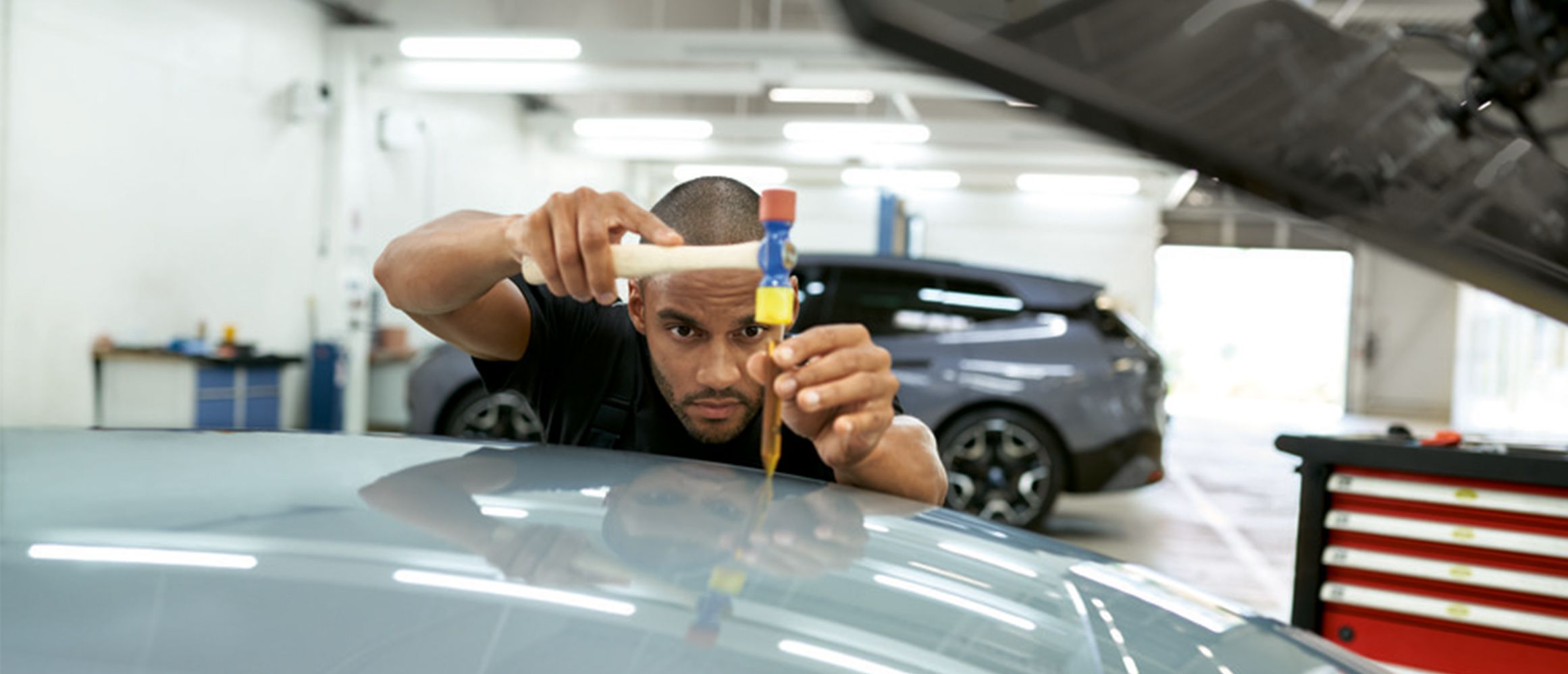 Dellenreparatur an einem BMW / MINI